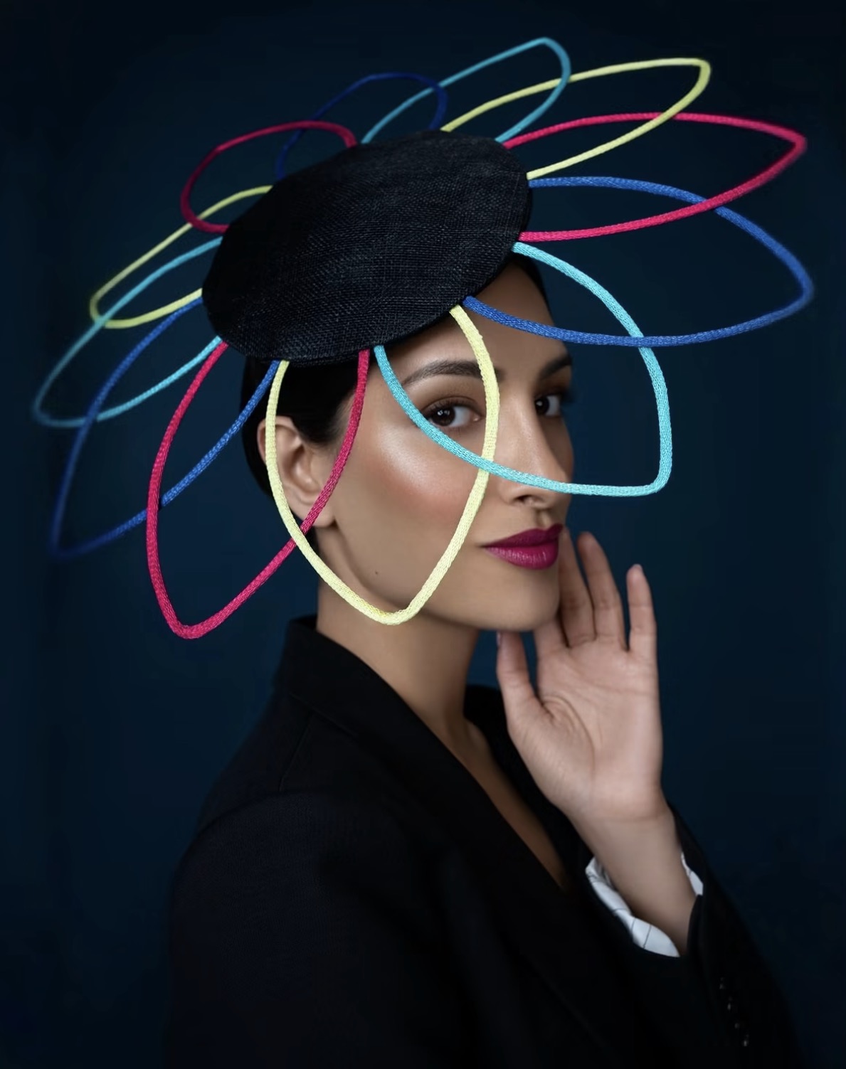 Colour-loop sculptural hat campaign photographed by Mariya Harley
